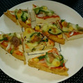 4double5's cooksnap of when they made トマトソースで厚揚げのピザ風.