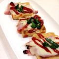 asuuumomo's cooksnap of when they made もちサクッ♫簡単おつまみ♡油揚げのピザ♡.