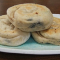 よちりん's cooksnap of when they made くるくる巻いてね♪黒ゴマとチーズのおやき.