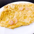 クックWCHLNL☆'s cooksnap of when they made 魚肉ソーセージのオープンオムレツカレー味.