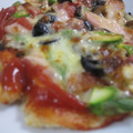 miyuki12's cooksnap of when they made 簡単★甘ーいトマトソースとオリーブのピザ.