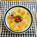 マルんちの丸顔's cooksnap of when they made お花みたい♪簡単ソーセージエッグパン.