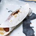 yknobi's cooksnap of when they made 余った餃子の皮でソーセージ巻き.
