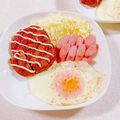 みぽぽ37's cooksnap of when they made 魚肉ソーセージとマルシン目玉焼き！.
