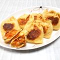 ＠迷子＠'s cooksnap of when they made ☼とろり♪納豆キムチーズの油揚げ巾着焼き.