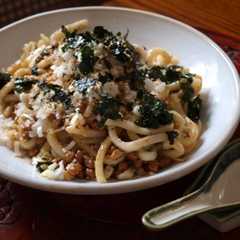 รูปของ 納豆と刻みうどんのごま油焼き