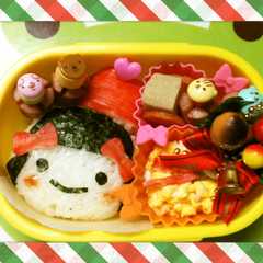 A picture of キャラ弁　サンタ帽子の女の子.