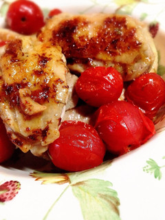 チキンのハーブ焼き。ミニトマト添え-レシピのメイン写真