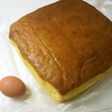 新聞紙の型で*大きいカステラ。