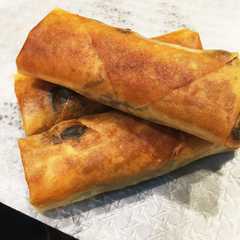 รูปของ コストコチャプチェで春巻き