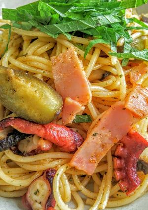 ﾀｺとﾍﾞｰｺﾝのﾄﾏﾄｿｰｽﾊﾟｽﾀ-レシピのメイン写真