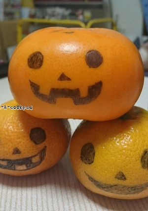 ミカンと柿でハロウィンジャックオランタン-レシピのメイン写真