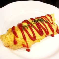 รูปของ しっかりよく焼きたまごのオムライス