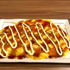 A picture of キャベツと卵のお好み焼き風.