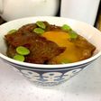 牛カルビ丼に卵黄のっけ盛り