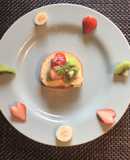 簡単デザート☆市販のロールケーキ果物のせ