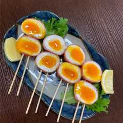 รูปของ 半熟卵のベーコン巻き串☆おつまみに♪