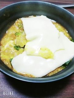 お鍋の〆。おじやととけるチーズ(ΦωΦ)-レシピのメイン写真
