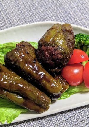 丸ごとピーマンのトロトロ肉詰め煮込み-レシピのメイン写真