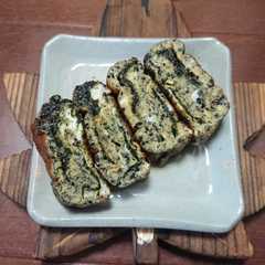 รูปของ 黒い卵焼き
