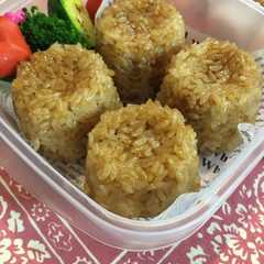 รูปของ カヌレ型焼きおにぎり