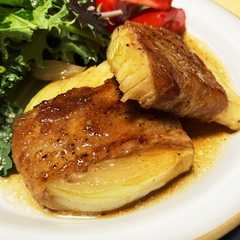 A picture of 新玉ねぎの豚バラ巻き照り焼き.