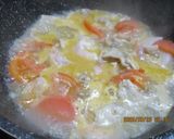 豚肉とトマトのコンソメクリームチーズ煮😋作り方3写真