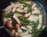 冷凍イカとアスパラのオイスターバター炒め作り方3写真