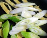 油揚げと長ネギの炒め物作り方4写真
