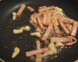 南瓜とベーコンのガリバタ炒め♪カレー風味作り方3写真