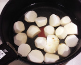 母の味♡柔らか味しみしみ里芋とタコの煮物作り方3写真