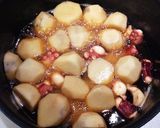 母の味♡柔らか味しみしみ里芋とタコの煮物作り方5写真