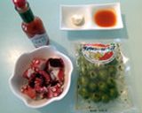 タコとスパイシーガーリックオリーブ炒め作り方1写真