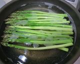 蒸し焼きで柔らか！アスパラの豚バラ肉巻き作り方2写真