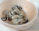 酒の肴に☆ニンニク牡蠣作り方1写真