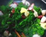 簡単☆菜の花とタコのガーリックバター作り方8写真