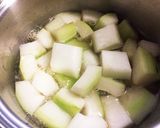 優しいお味♡姫冬瓜の油揚げとカニかま煮♪作り方3写真