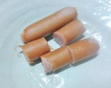 コンソメ茹でキャベツ巻きソーセージ串作り方3写真