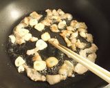 ニンニク風味　たっぷり根菜と豚肉の炒め煮作り方3写真