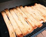 簡単おつまみ☆こんがりパン耳ガーリック作り方5写真