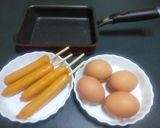 オムドッグ（串つきソーセージの卵巻き）作り方1写真