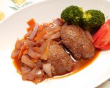 赤ワインで濃厚に!*煮込みハンバーグ作り方7写真