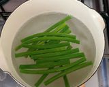 ミニトマトと茎にんにくの豚肉巻き巻き作り方3写真