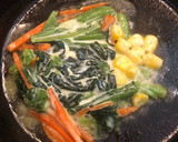 コーンとほうれん草、にんじんのバター炒め作り方3写真