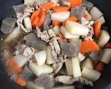 大根と人参と豚肉の炒め煮作り方5写真