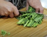 鮮やかで映える♪菜の花とトマトの中華炒め作り方2写真