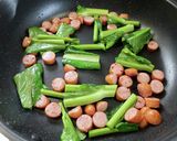 簡単！菜の花とウィンナー☆めんつゆ炒め作り方3写真