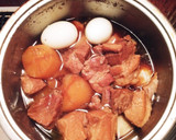 簡単☆豚肉と大根と卵の煮物作り方3写真