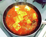 さば缶と豆腐のトマト缶煮込みでチーズ焼き作り方4写真