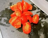 余った唐揚げ活用♪トマトの卵炒めにのせて作り方1写真